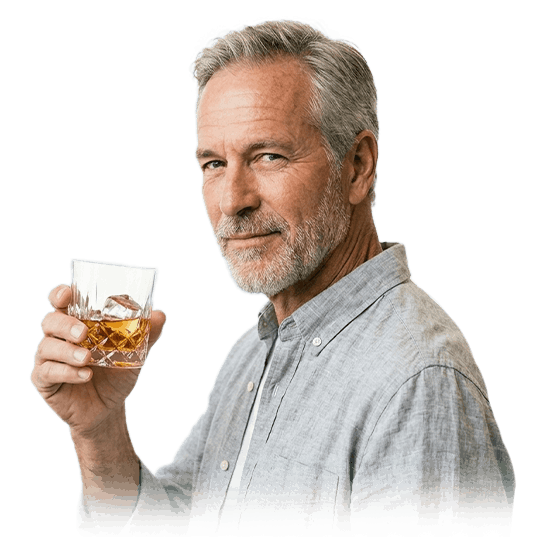 man sipping whiskey